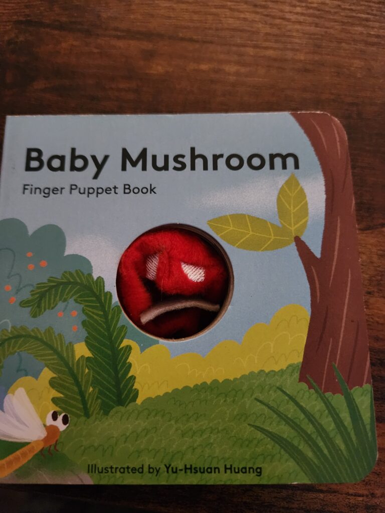 Christmas Gift Guide 23:                  Baby Mushroom Finger Puppet Book Illustrated by Yu-Hsuan Huang from Chronicle Kids. 